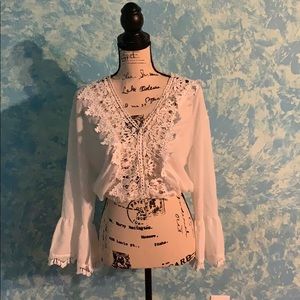 Cropped long flowy sleeved shirt